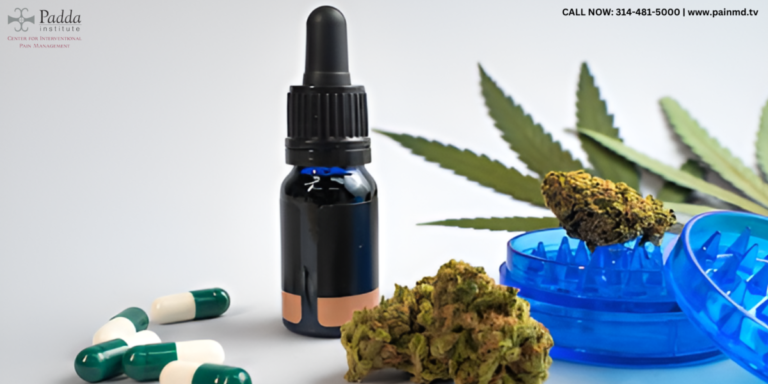 Dropper bottle of cannabis oil beside capsules, a grinder and a cannabis leaf