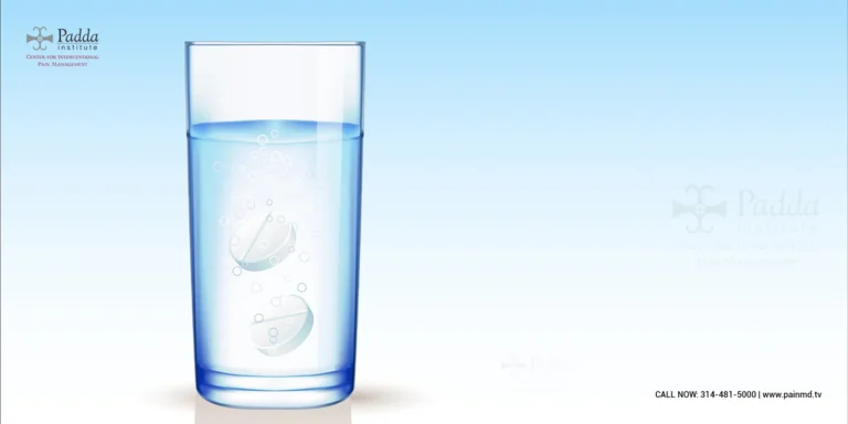 Effervescent tablet dissolving in a glass of water