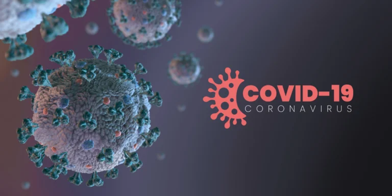 Illustration of coronavirus particles labelled COVID-19