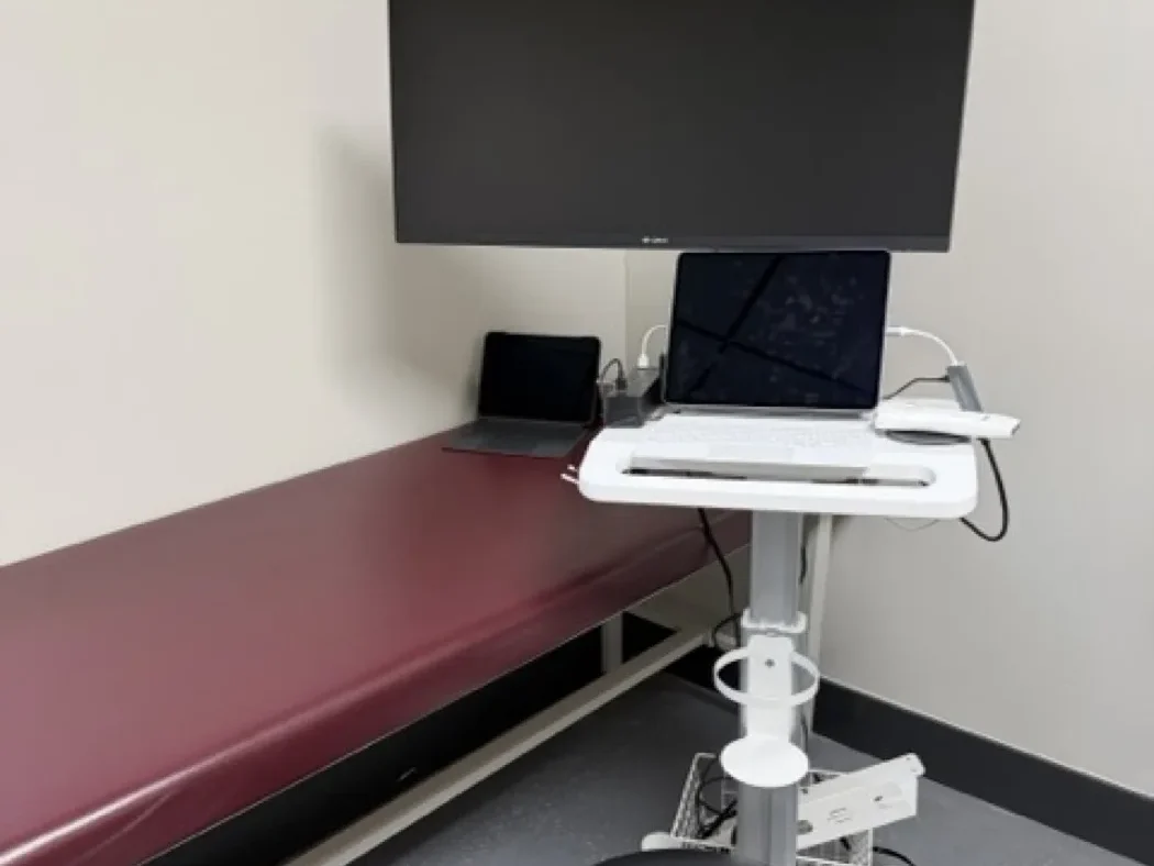 Diagnostic ultrasound cart and exam table used for nerve and joint assessment at Padda Institute, 4477 Woodson Road, St. Louis, MO 63134