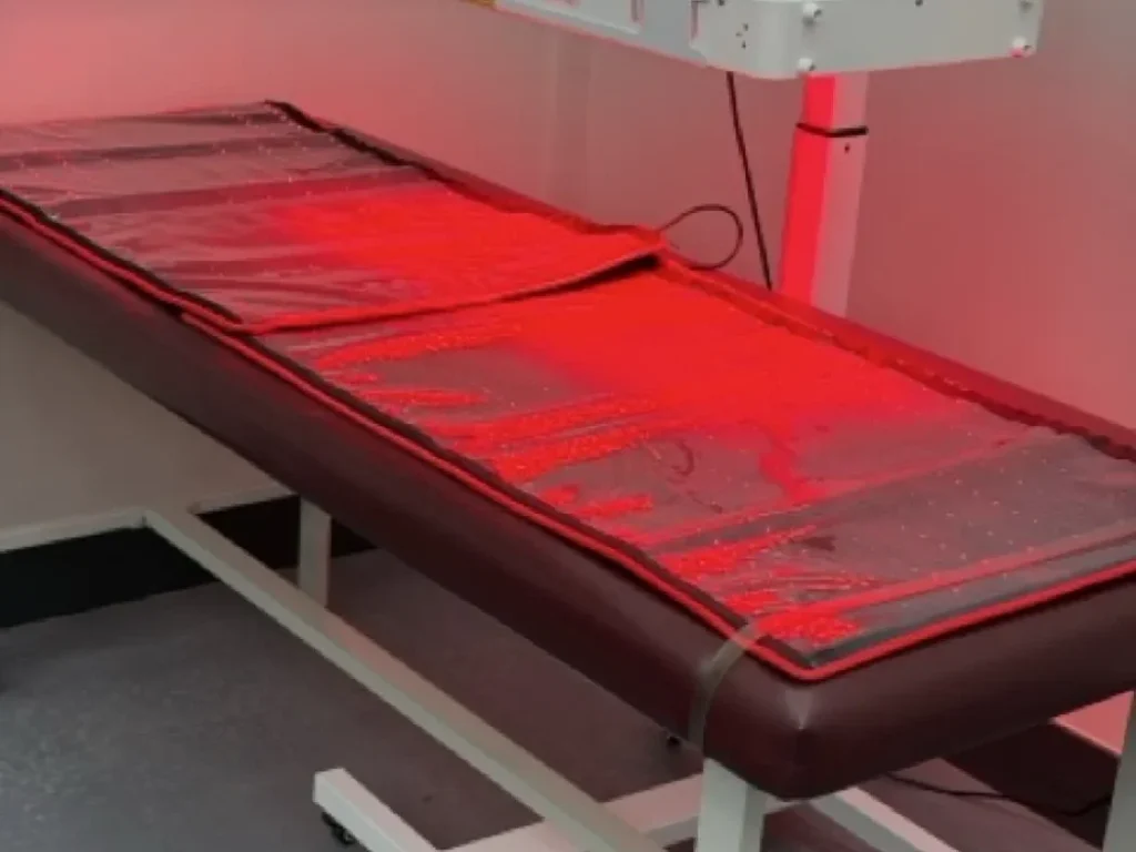 Whole body high intensity infrared therapy table at Padda Institute, St. Louis