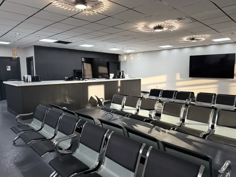 Patient waiting room and check-in desk at Padda Institute Center for Interventional Pain Management, 4477 Woodson Rd, St. Louis, MO