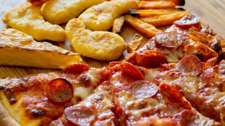 Pizza, fried chicken nuggets and fries, the refined, fried foods that drive metabolic inflammation