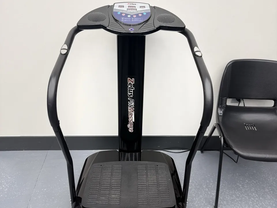 Whole body vibration platform in the therapy area at Padda Institute, St. Louis